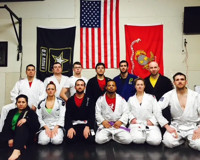 Students training together on the mats